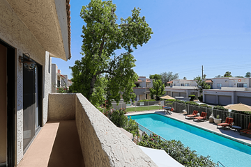 Scottsdale townhouse for rent - A pool area with a view of a residential area.