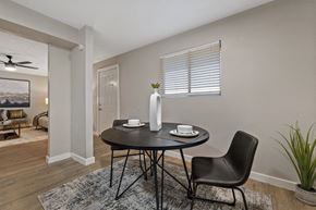 Phoenix apartment for rent - A dining room with a table set for two.