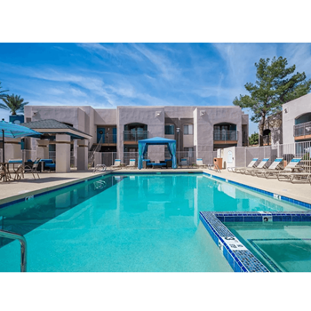 Two sparkling pools and relaxing heated spa