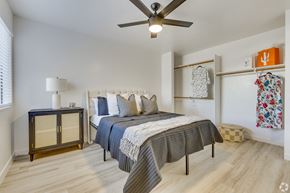 Glendale apartment for rent - a bedroom with a bed and a ceiling fan