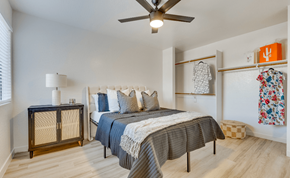 Glendale apartment for rent - a bedroom with a bed and a ceiling fan
