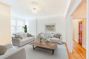 Washington apartment for rent - a living room with couches and a coffee table