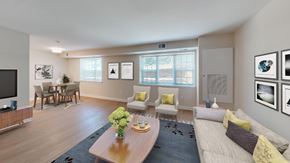 Washington apartment for rent - A living room with a couch, chairs, and a coffee table.