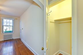Washington apartment for rent - hallway closet with built in shelving at 4020 calvert street apartments in washington dc