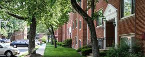 Bethesda apartment for rent - exterior of brick apartment building at cambridge square apartments in bethesda md