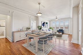 Washington apartment for rent - A dining room with a table set for four.