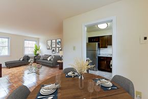 Washington apartment for rent - dining area with table, chairs, view of kitchen and living area at colonnade apartments in washington dc