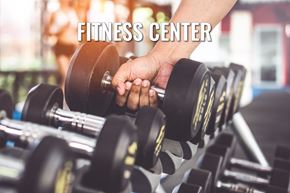 Washington apartment for rent - A person is lifting a dumbbell in a fitness center.