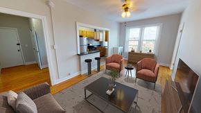 Washington apartment for rent - A living room with a couch, chairs, and a coffee table.