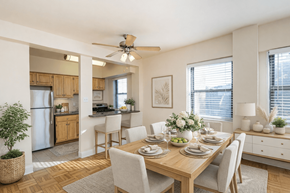 Washington apartment for rent - A dining room with a table set for a meal.