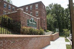 Washington apartment for rent - brick exterior of the oaks apartments in washington dc