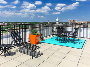 Washington apartment for rent - rooftop lounge with lounge chairs, social seating and tables at the norwood apartments in adams morgan washington dc