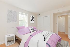 Washington apartment for rent - bedroom with hardwood flooring at the oaks apartments in washington dc