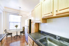 Washington apartment for rent - kitchen with view of dining area at wakefield hall apartments in washington dc