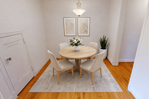 Chevy Chase apartment for rent - A white dining room with a round table and chairs.