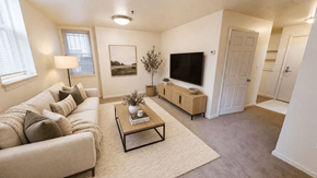 Washington apartment for rent - A living room with a couch, coffee table, and a television.