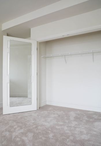 Beige carpet in bedroom