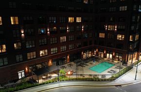 Owings Mills apartment for rent - Outdoor Ariel Night View at The Met at Metro Centre Apartments, Maryland, 21117