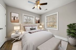Marietta apartment for rent - A bedroom with a bed, a ceiling fan at Balfour Marietta Apartments, Marietta