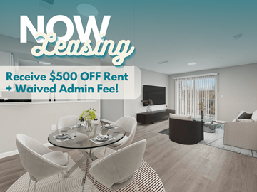 Atlanta apartment for rent - A modern living room with a dining table set for four and a sofa.