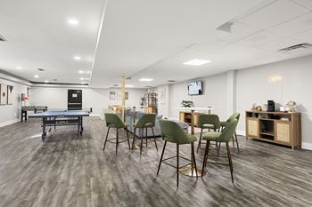 Clubroom with games and lots of lounge seating