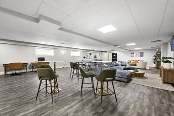Clubhouse with hightop seating and chairs