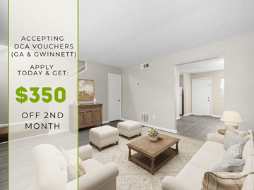Norcross apartment for rent - A living room with a coffee table and two chairs is shown with text offering a $350 discount for accepting DCA vouchers.