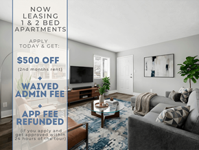 Lawrenceville apartment for rent - A living room with a sign offering $500 off for leasing 1 & 2 bed apartments.