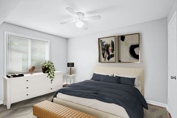 Spacious bedroom with ceiling fan