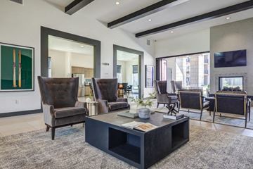 Denver apartment for rent - a living room with a fireplace and a coffee table