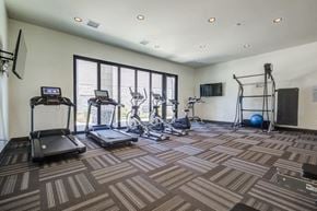 Denver apartment for rent - A spacious gym with a variety of exercise equipment.