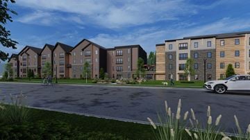 Steamboat Springs apartment for rent - A white car is parked in front of a building.
