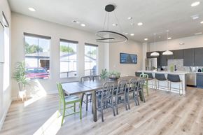 Longmont apartment for rent - a dining room and kitchen with a table and chairs