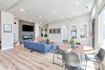 Longmont apartment for rent - a living room with a couch and a table