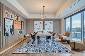 Denver apartment for rent - A modern dining room with a large table and chairs.