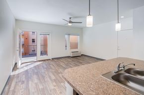 Rio Rancho apartment for rent - A kitchen with a sink and a fan.