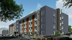 Colorado Springs apartment for rent - A modern apartment complex with a parking lot in front.