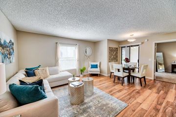 Phoenix apartment for rent - a living room and dining room with a couch and a table
