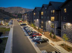 Steamboat Springs apartment for rent - A parking lot with cars parked in it.