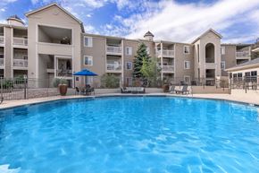 Lakewood apartment for rent - A large swimming pool in front of apartment buildings.