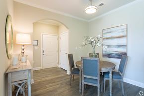 Gallatin apartment for rent - A dining room with a wooden table and chairs.