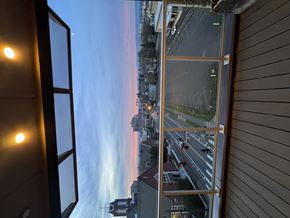 Vancouver apartment for rent - A view from a window looking out at a city street.