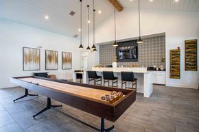 Clarksville apartment for rent - a game room with a pool table and sitting area