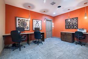 Salt Lake City apartment for rent - a conference room with three desks and chairs and a door