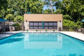Nashville apartment for rent - a swimming pool with a building in the background