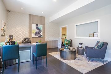 Nashville apartment for rent - a living room with a desk and chairs and a couch