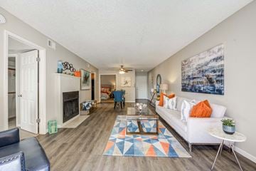 Phoenix apartment for rent - a living room with a white couch and a fireplace