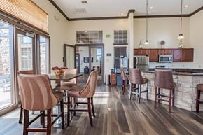 Colorado Springs apartment for rent - a kitchen and dining area with a table and chairs