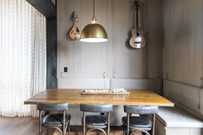 Nashville apartment for rent - a conference room with a wooden table and four chairs