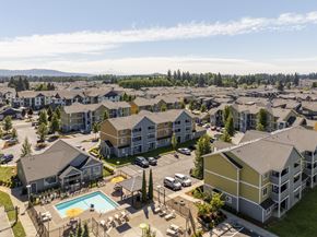 Vancouver apartment for rent - an aerial view of an apartment complex with a swimming pool